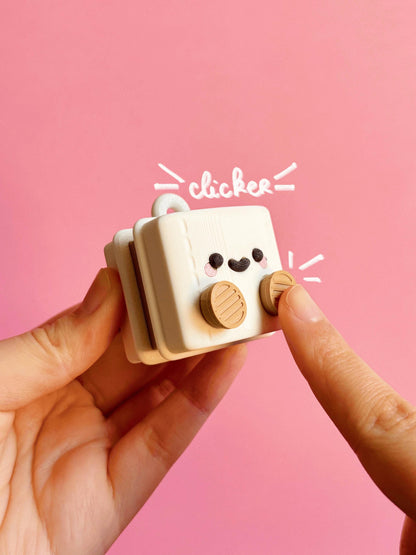 Papel higiénico articulado con clicker: juguete antiestrés y llavero